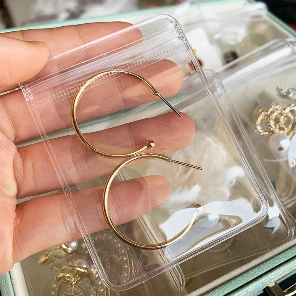 100 Pack PVC Clear Jewelry Anti Oxidation Zipper Bag Antitarnish Plastic Bags for Packaging Jewelry Rings Earrings Transparent Poly Pouch (Light Blue, 2.363.14inch)